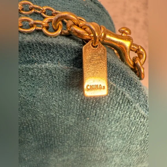 Coach Gold-Tone Anchor Pendant Necklace with Pave Crystals - Picture 6 of 8